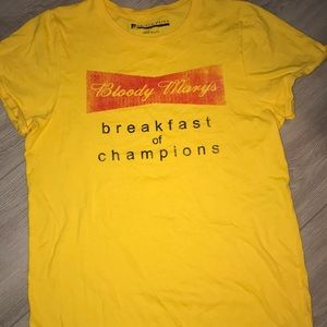 Bright yellow graphic tee by Prince Peter.